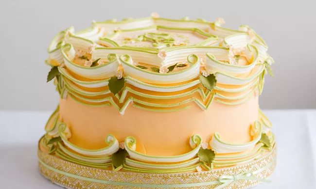 A beautiful hand-piped cake in the baking arts program.
